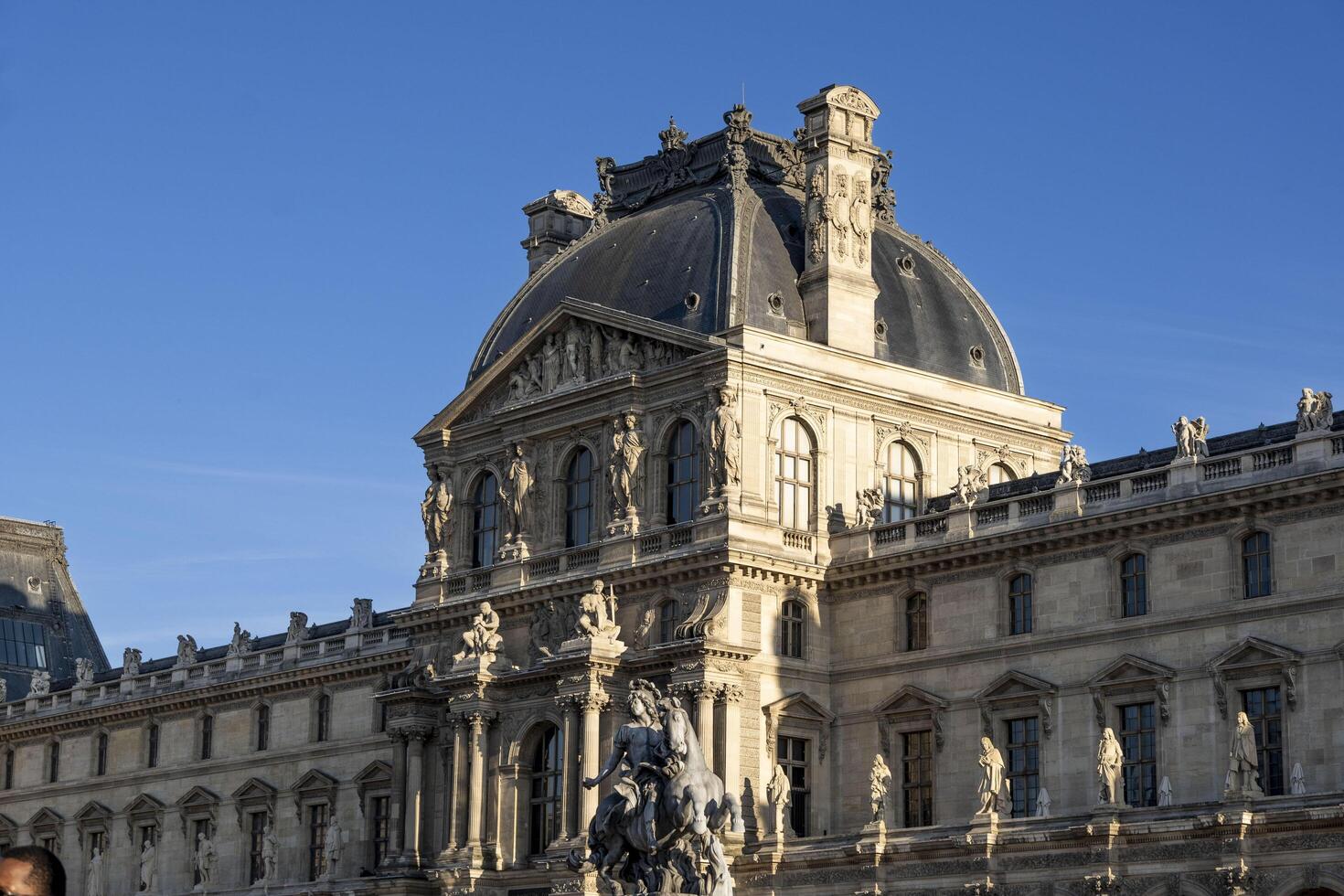 The Louvre, on the right bank of the Seine, in Paris, France's national art museum, housing important iconic works. photo