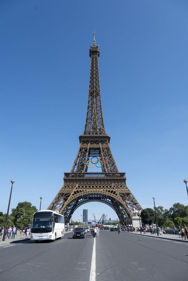 Eiffel Tower with Olympic rings to mark the games taking place in the city photo