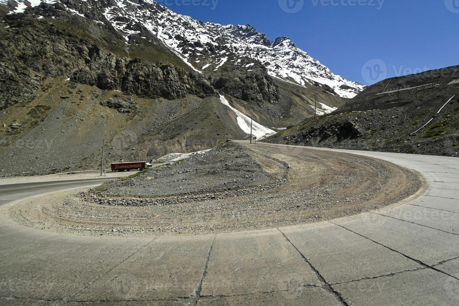 Los Caracoles desert highway, with many curves, in the Andes mountains photo