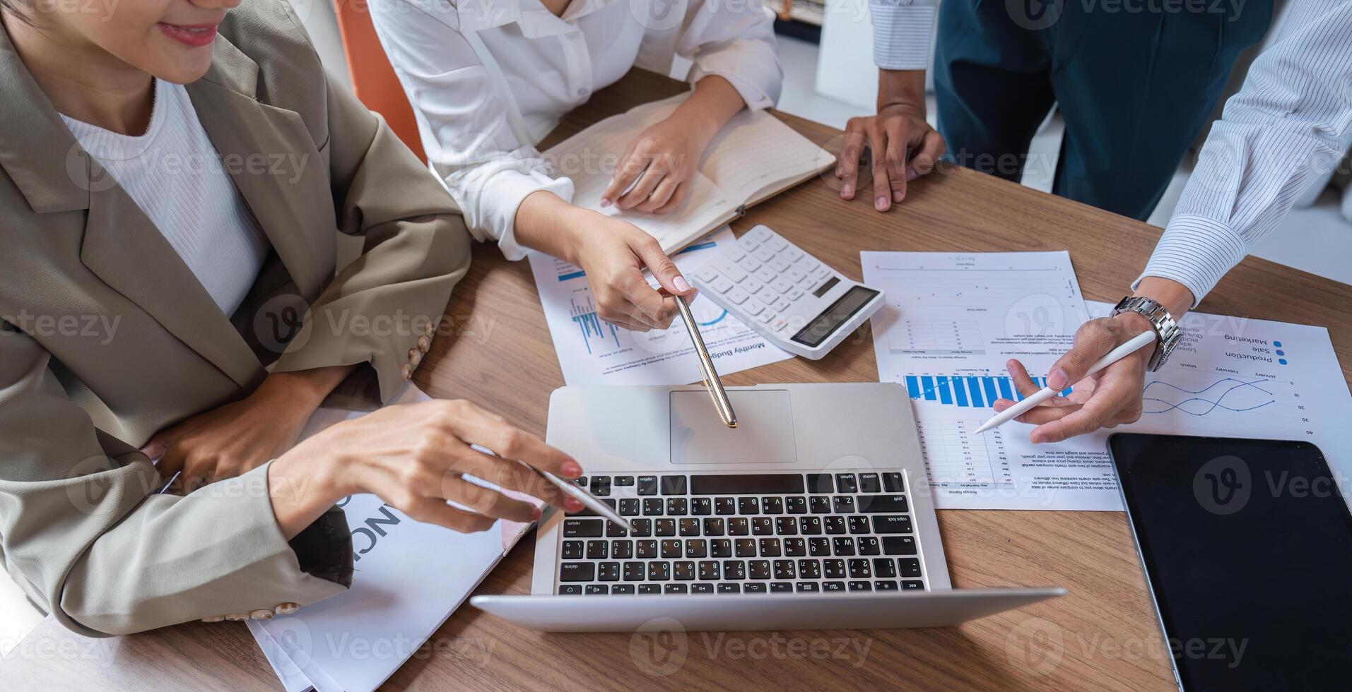 Business Team Collaborating and Exchanging Ideas in a Modern Office Environment photo