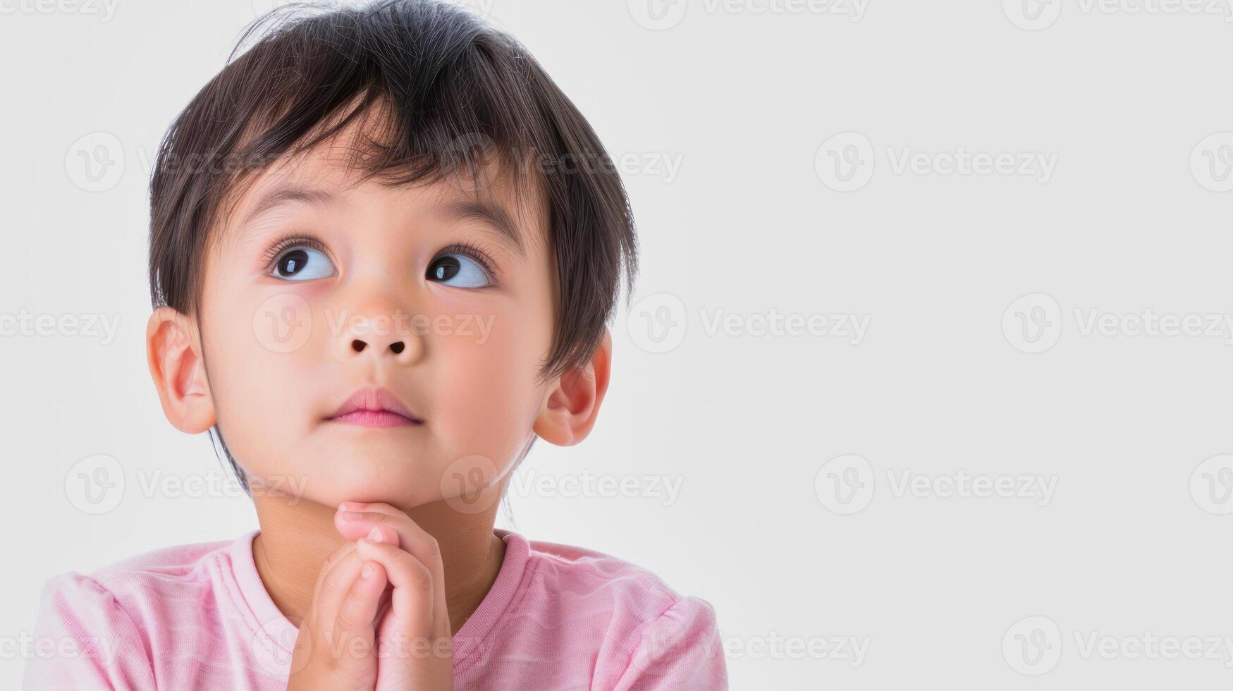 chinese kid thinking, copyspace photo