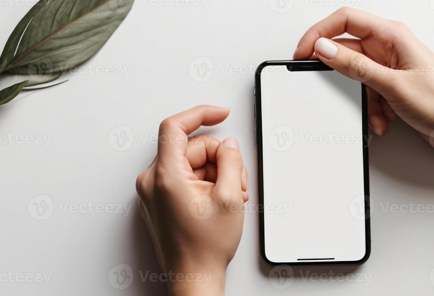 Person's hand holding black smartphone isolated on background, technology template photo