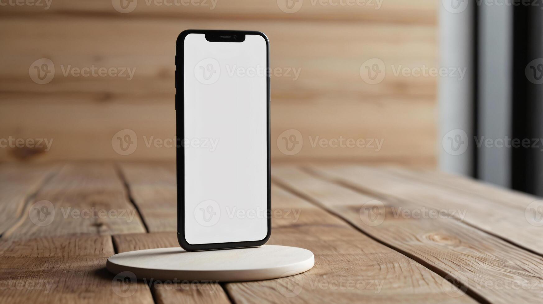 Black mobile smartphone mockup with blank screen isolated on a table, application or design project. photo