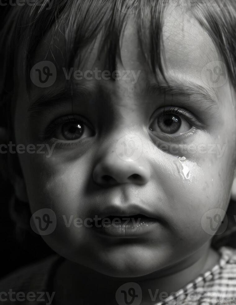 a black and white of a crying child photo