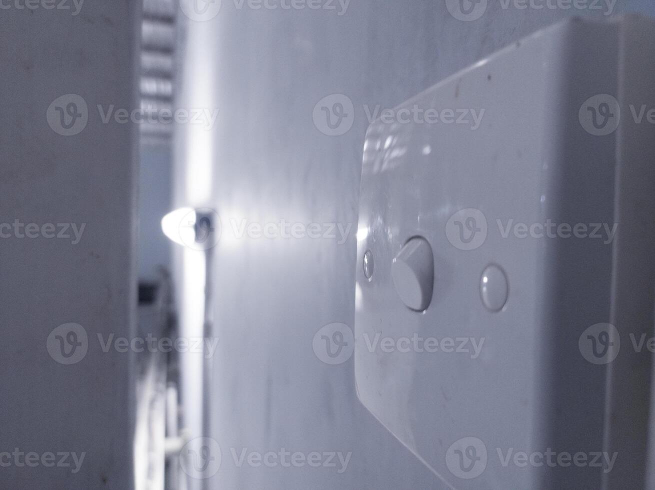 Close up the Switch lamp on the wall building interior in industry. photo