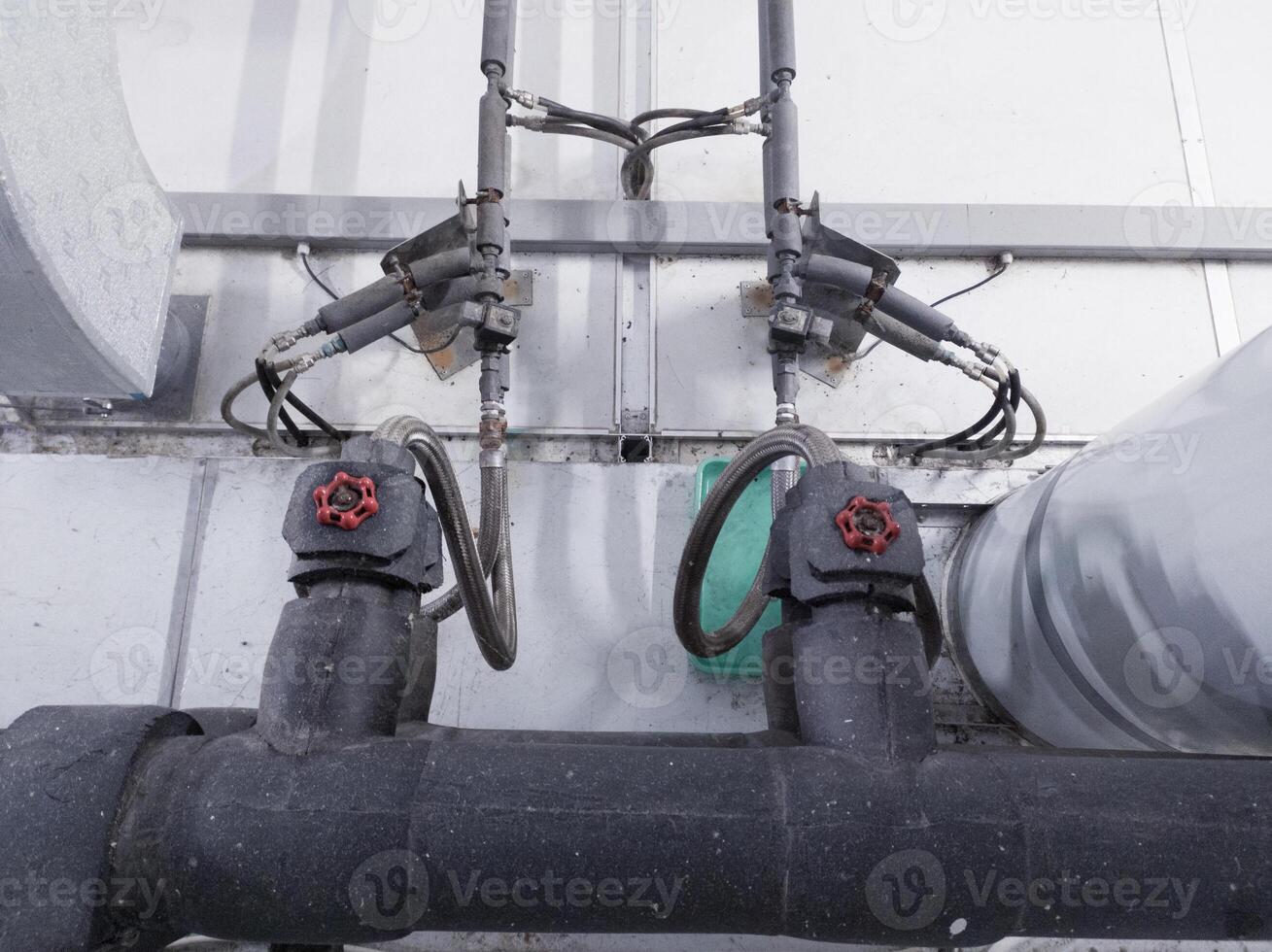 Industrial pipe line with insulation for water chiller circulation on the machinery hatchering. photo