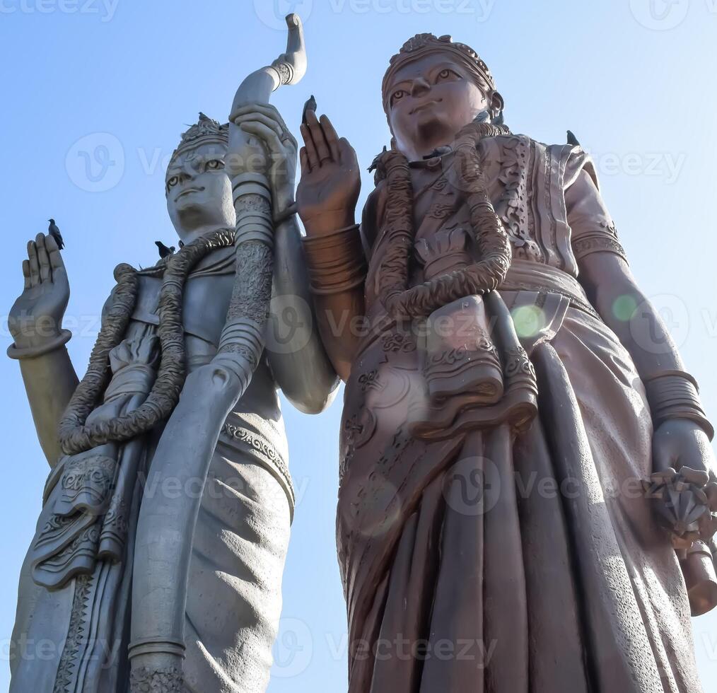 Big statue of Lord Sita Ram near Delhi International airport, Delhi, India, Lord Ram and Sita big statue touching sky at main highway Mahipalpur, Delhi photo