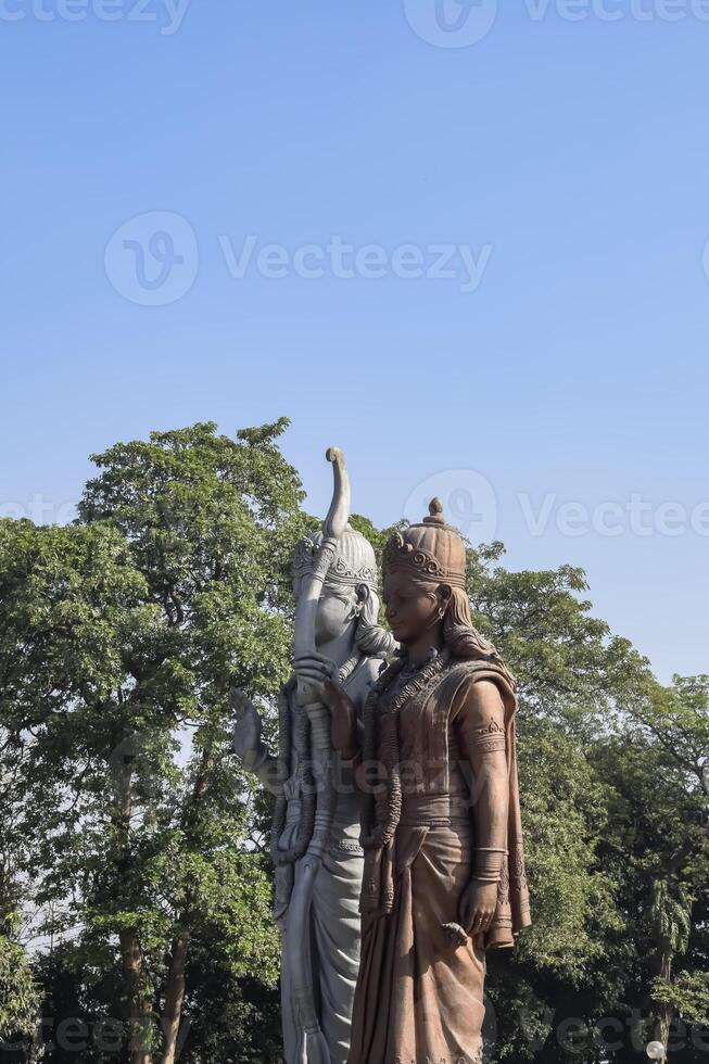 Big statue of Lord Sita Ram near Delhi International airport, Delhi, India, Lord Ram and Sita big statue touching sky at main highway Mahipalpur, Delhi photo