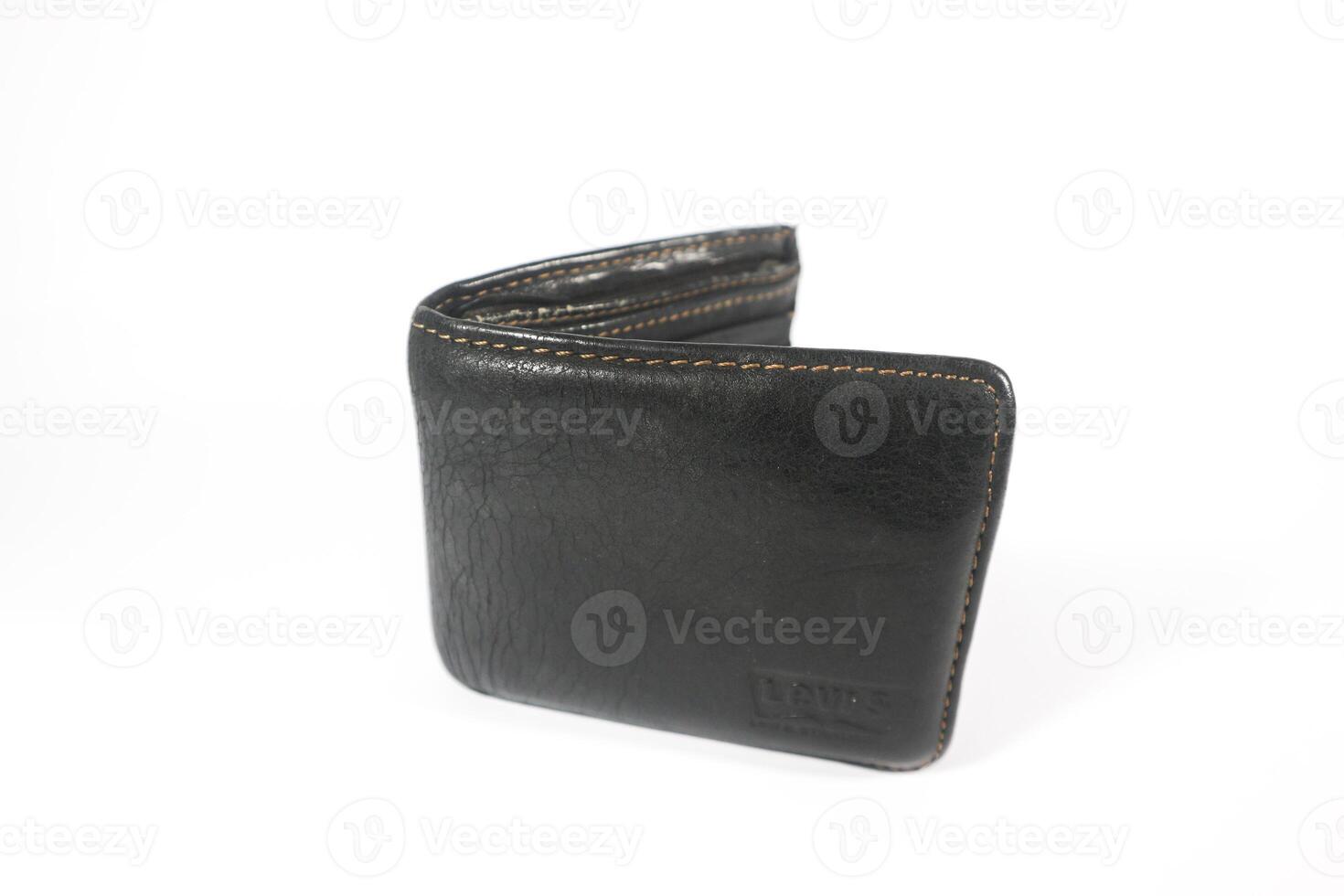 isolated black leather texture wallet with white background. Isolated background. Male purse photo