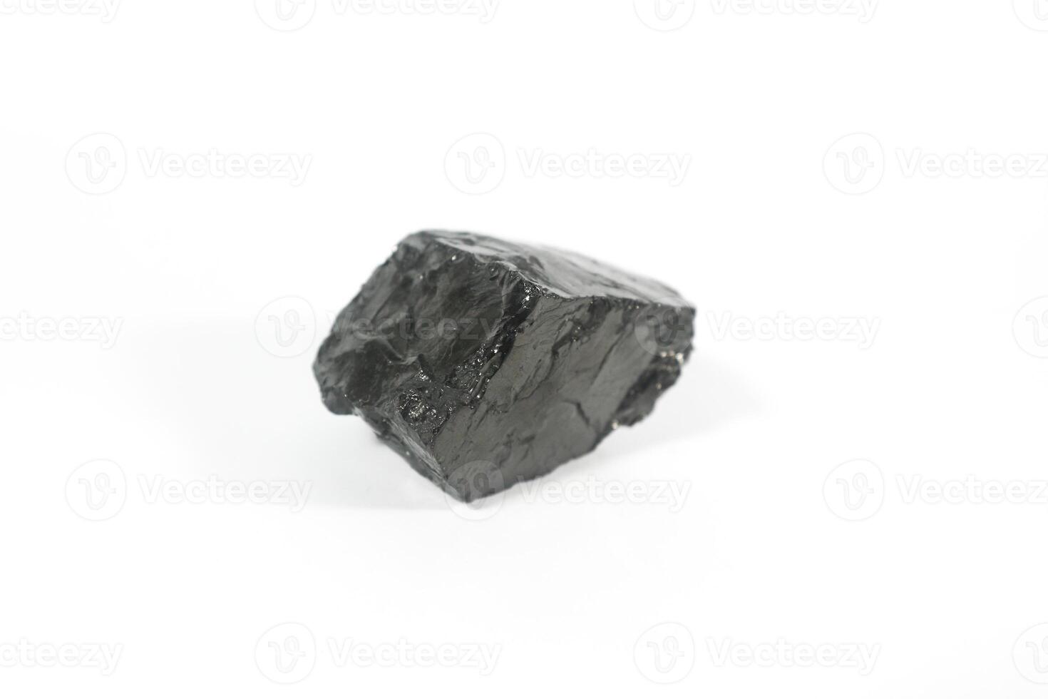 coal on a white background. Isolated on white. Coal can be a fuel that is cheaper than others photo