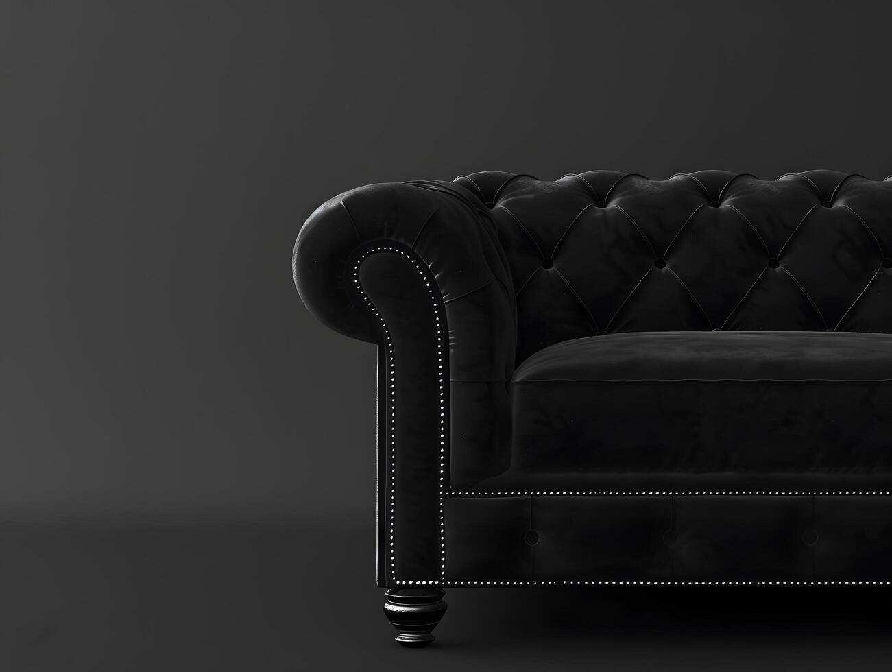 Black chic soft comfortable sofa on a black plain background photo