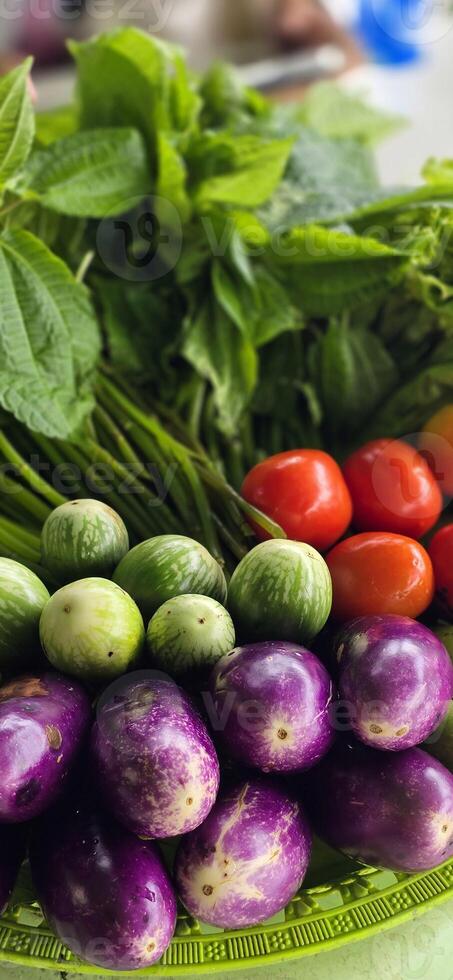 assortment of fresh organic vegetables and fruits in colorful arrangement , good for cooking multimedia creative content creation photo