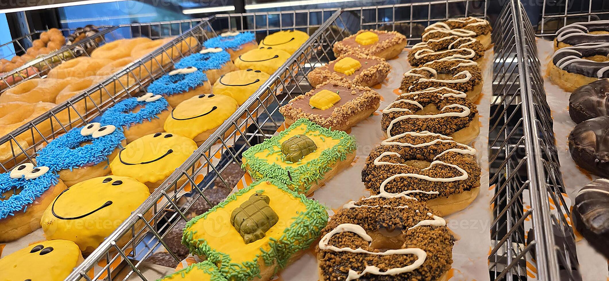 Delicious assortments of sugary donuts with different flavors and colorful topping good for backgrounds and multimedia content photo
