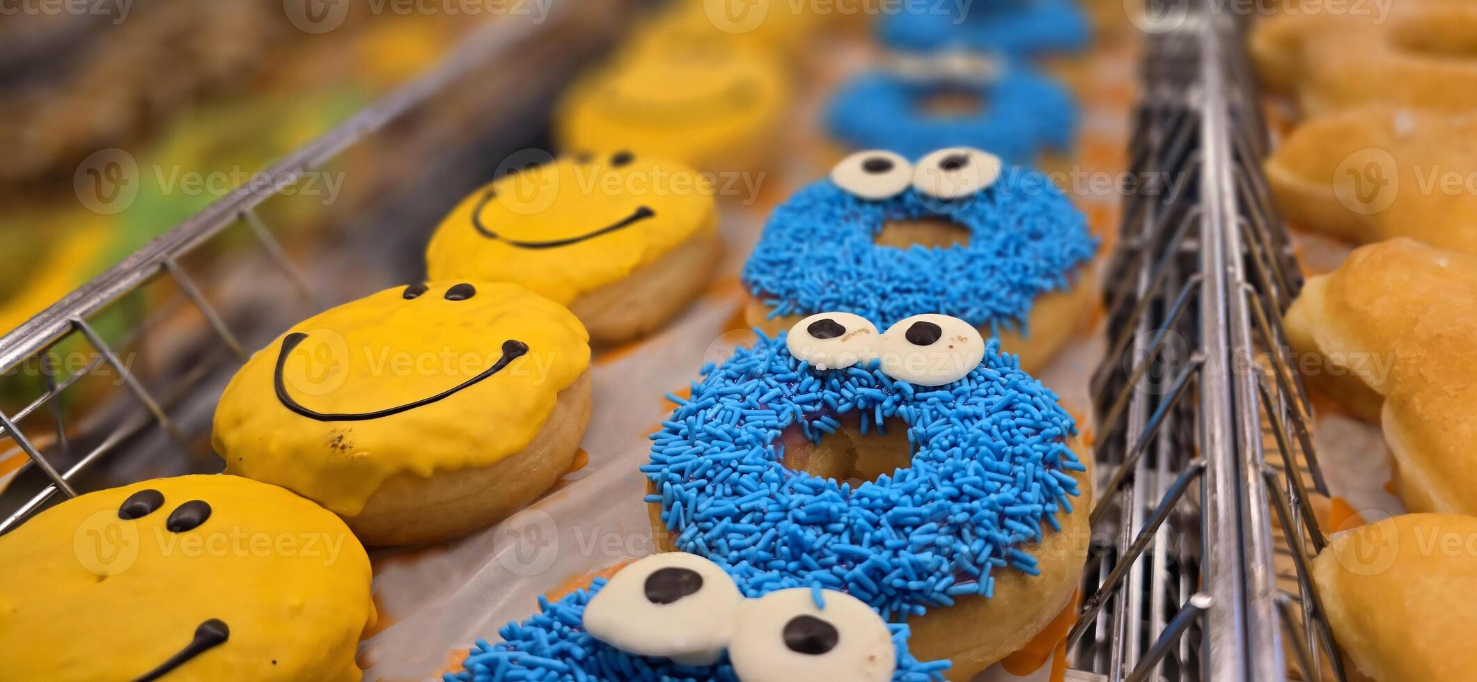 Delicious assortments of sugary donuts with different flavors and colorful topping good for backgrounds and multimedia content photo