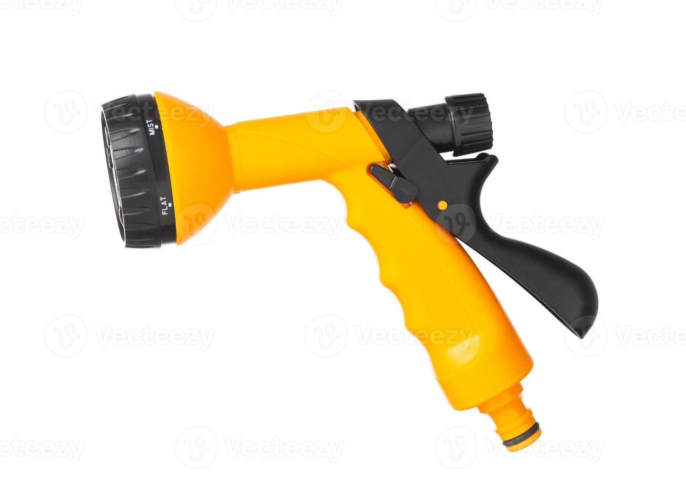 yellow nozzle on a hose for watering isolated on a white background photo
