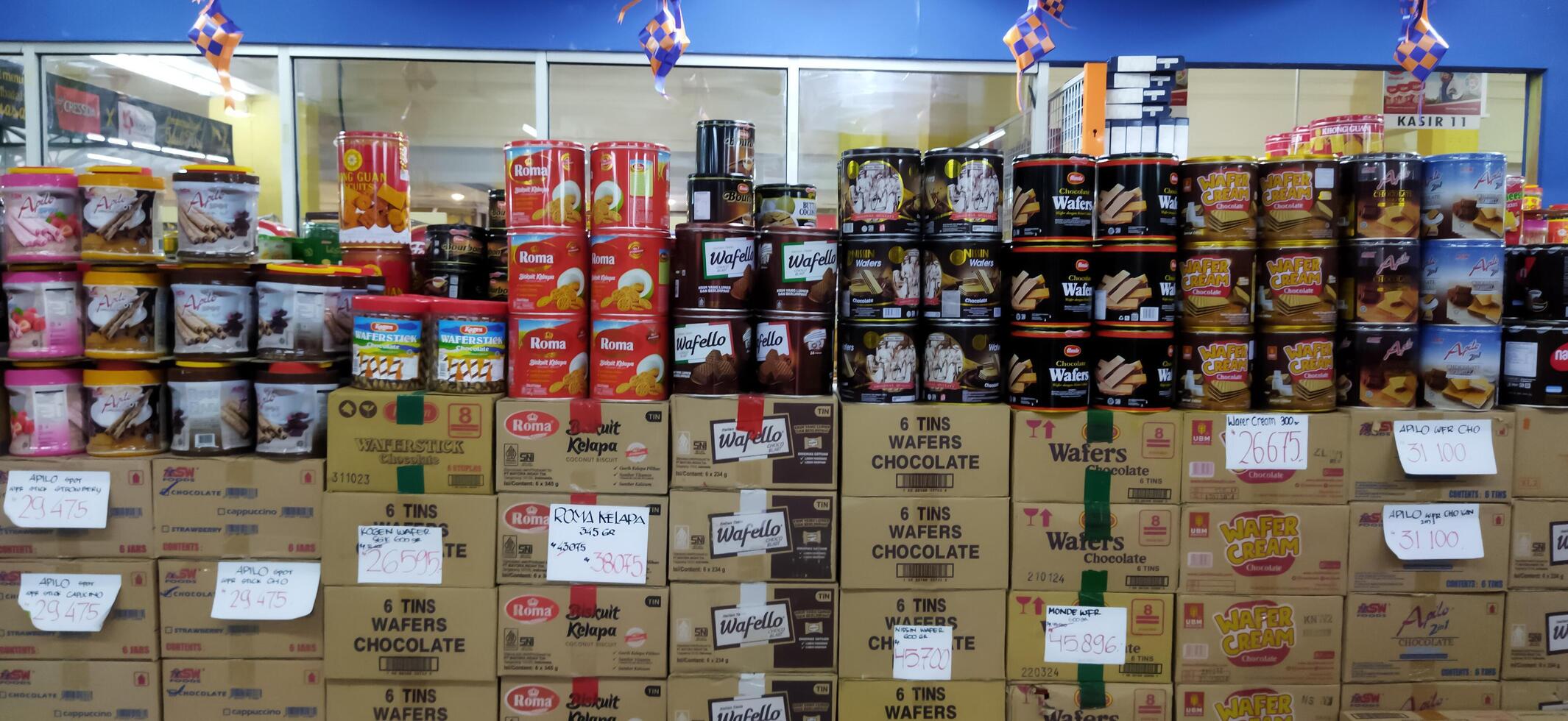 Surakarta, Indonesia, March 11, 2023. Stock of various kinds of biscuits in the supermarket to welcome the month of Ramadan and Eid al-Fitr. Luwes Mall. photo