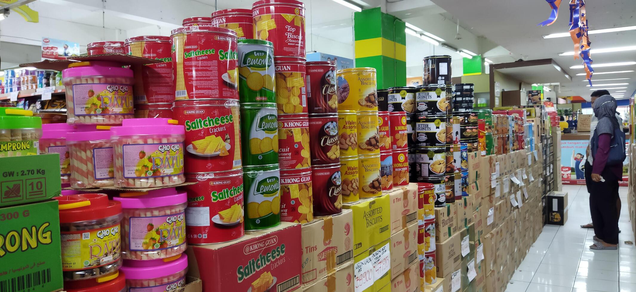 Surakarta, Indonesia, March 11, 2023. Stock of various kinds of biscuits in the supermarket to welcome the month of Ramadan and Eid al-Fitr. Luwes Mall. photo