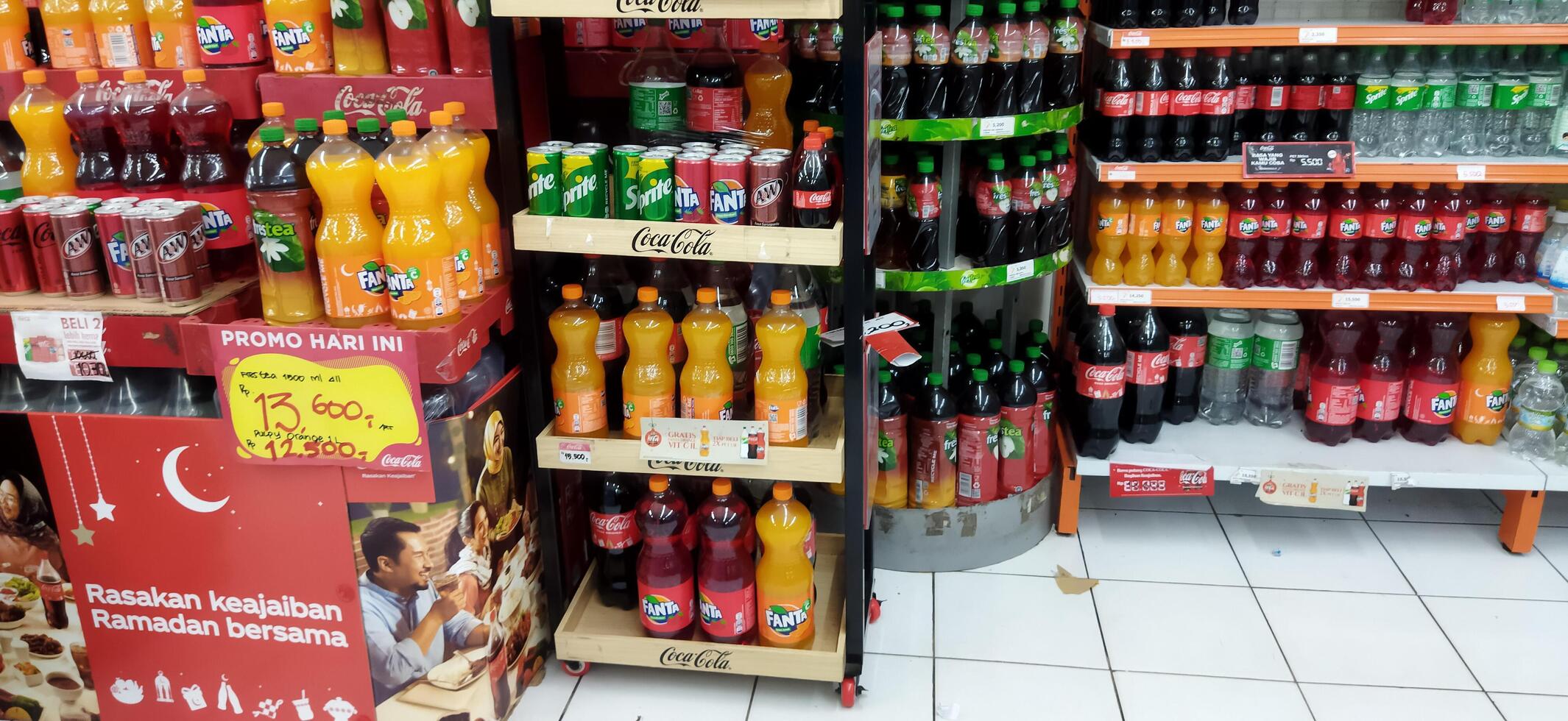 Surakarta, Indonesia, March 11, 2023. Stock of various kinds of syrup and fresh drink in the supermarket to welcome the month of Ramadan and Eid al-Fitr. Luwes Mall. photo