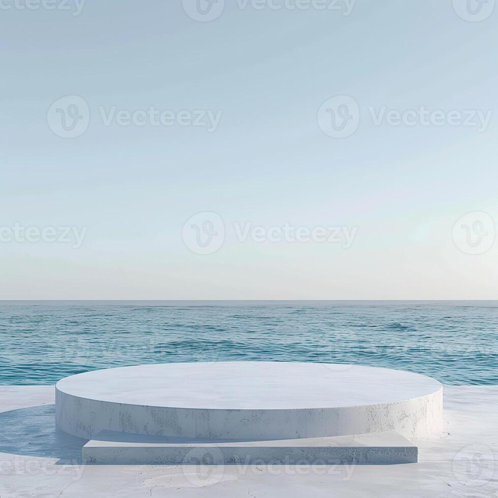 A round podium on the beach, surrounded by sand and sea in light beige tones photo