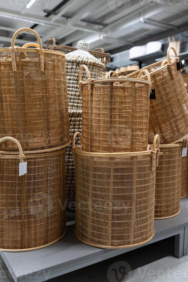 Large woven baskets. Six large decorative baskets with wooden handles. photo