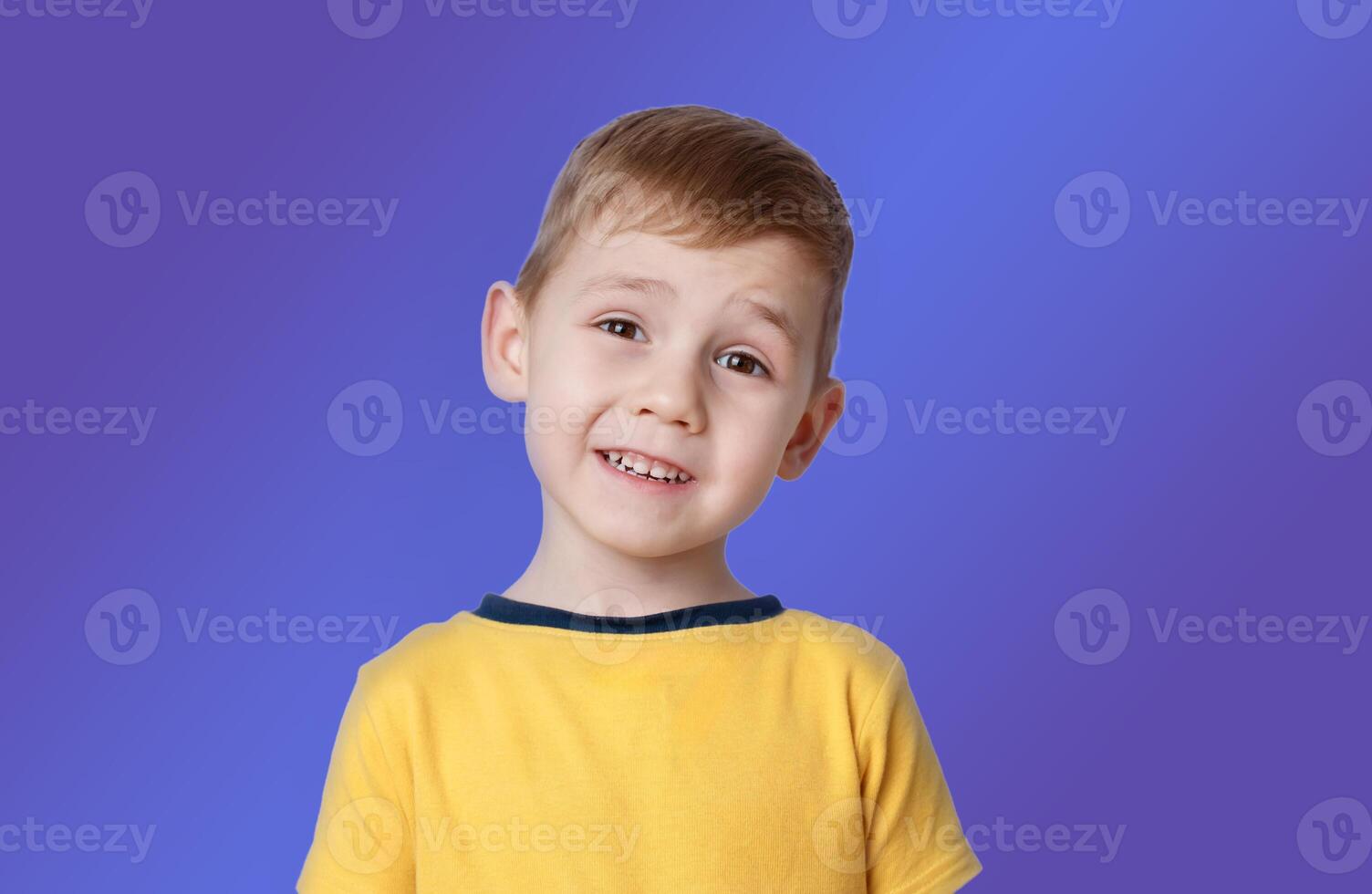 portrait of a little boy with the emotion of misunderstanding, surprise thoughts photo