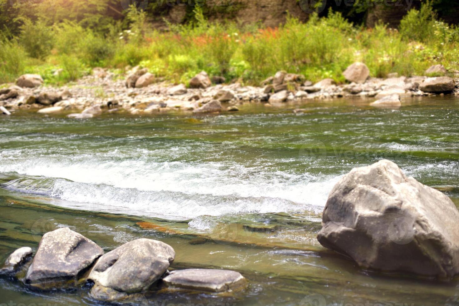 mountain river, landscape in the Carpathian Mountains, view on the rock photo