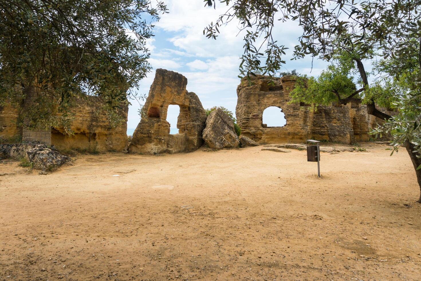 Agrigento, Italy-May 10, 2022-the imposing Greek Temple of Juno inside the Valle di Templi archaeological park near Agrigento during a sunny day photo