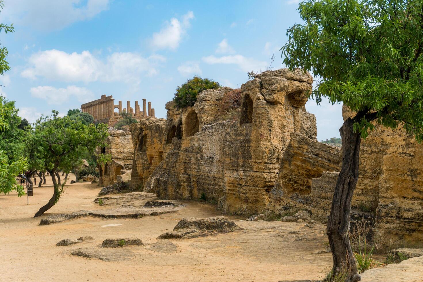 Agrigento, Italy-May 10, 2022-the imposing Greek Temple of Juno inside the Valle di Templi archaeological park near Agrigento during a sunny day photo