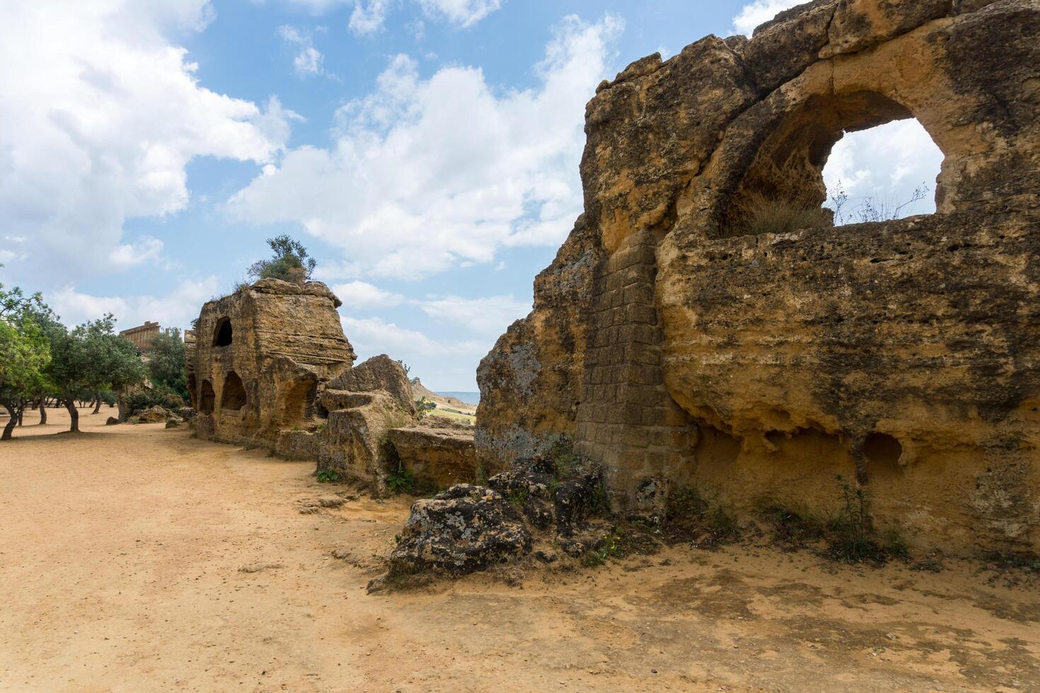 Agrigento, Italy-May 10, 2022-the imposing Greek Temple of Juno inside the Valle di Templi archaeological park near Agrigento during a sunny day photo