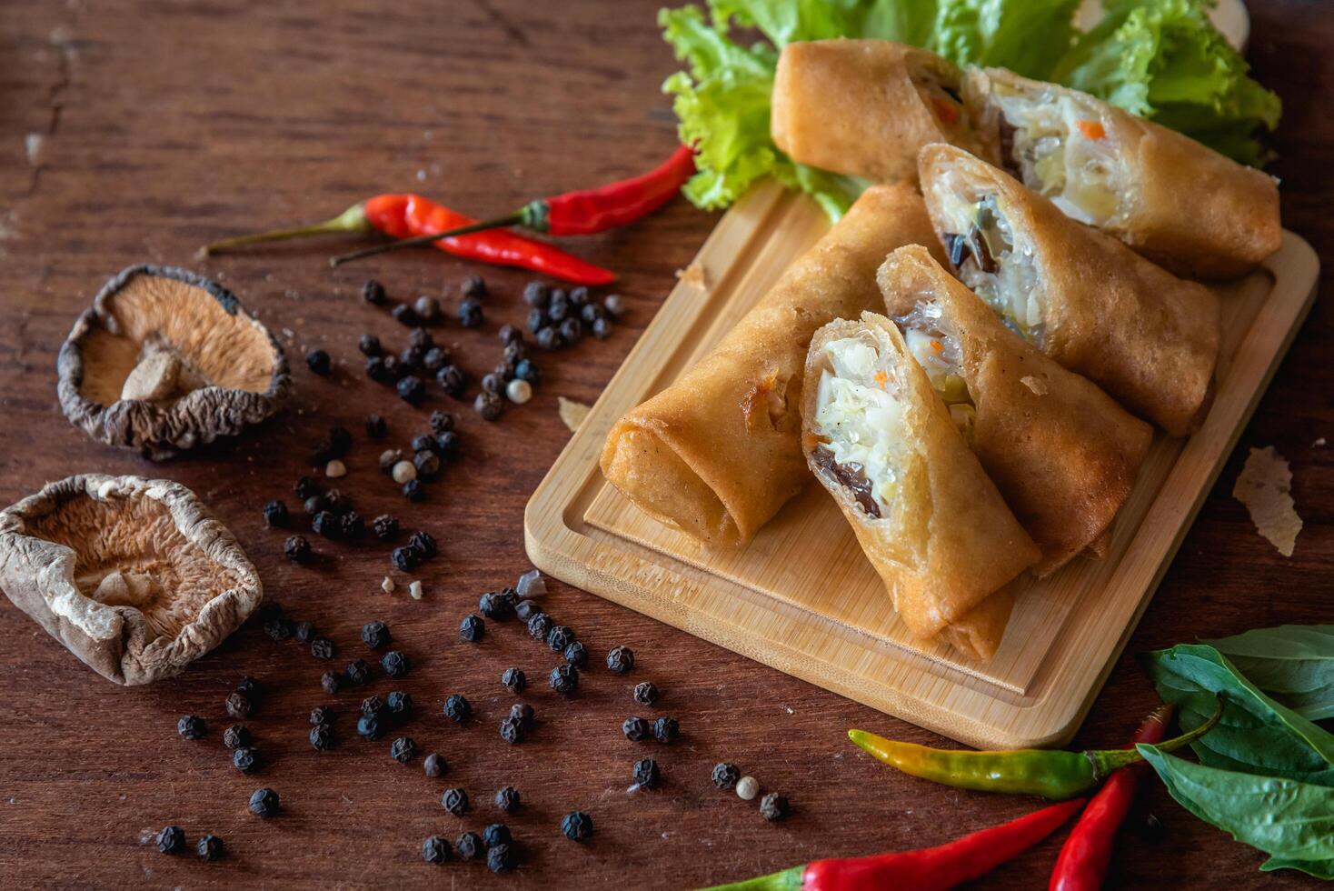 Closed up Deep fried spring rolls stuffed vegetable, mushroom and glass noodle, Chinese vegetarian food festival photo
