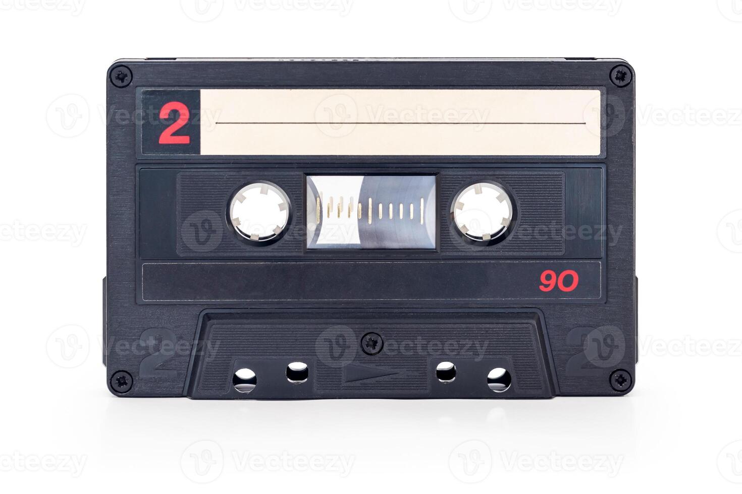 Audio cassette tape - old vintage compact audio cassette isolated on white background, with clipping path photo