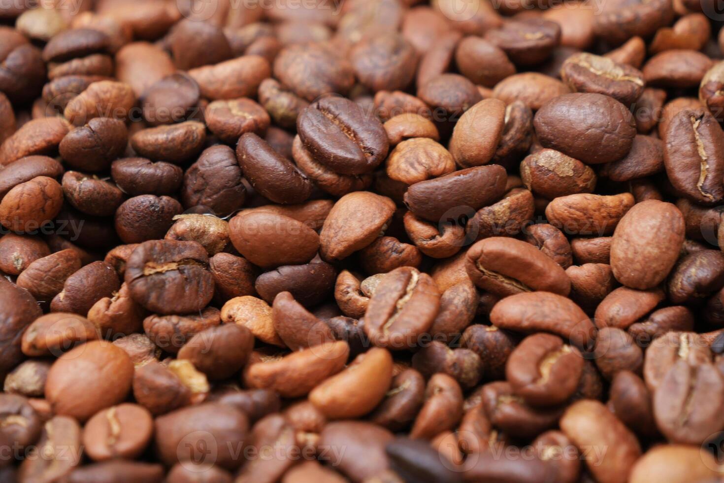 fresh coffee beans on black background photo