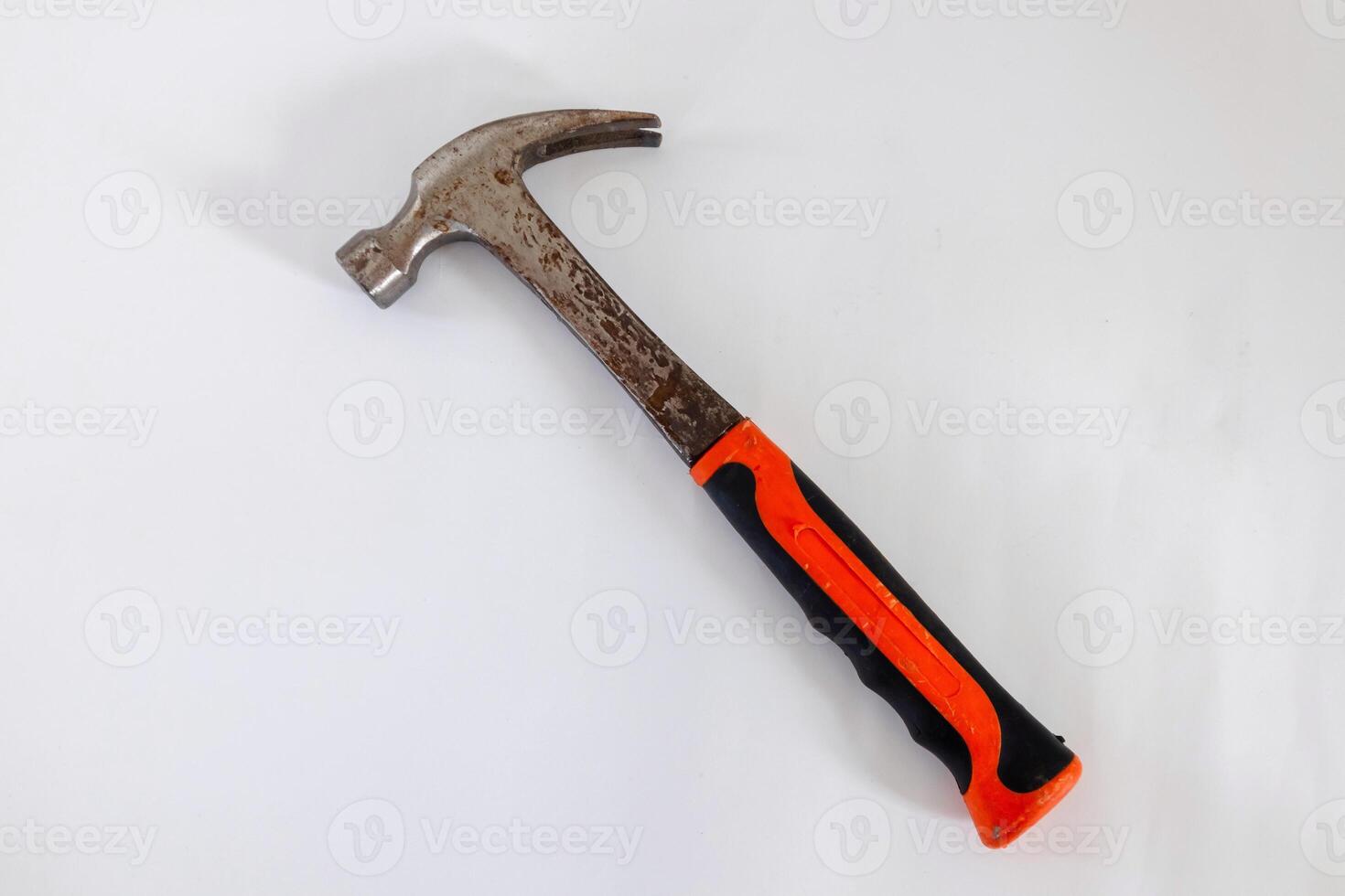 A rusty hammer on a white background photo
