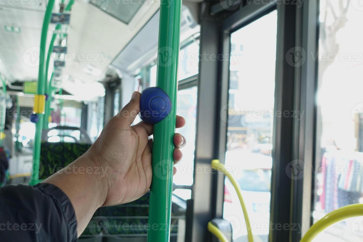 Closeup of Bus bell switch for stop inside the public bus photo