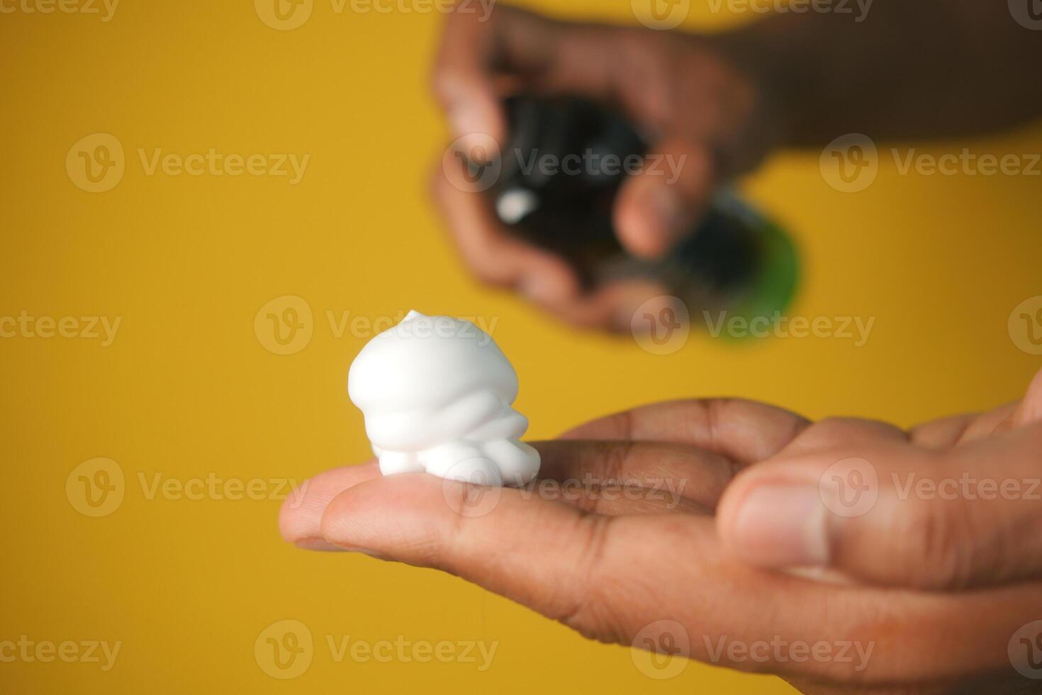 top view of shaving foam on hand photo