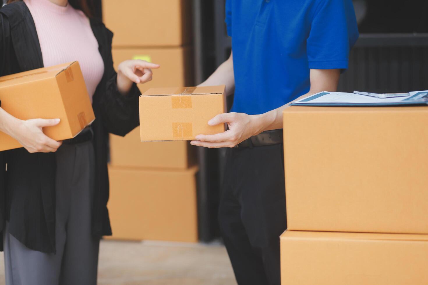 Truck Mover Unloading Van Carrying Boxes And Moving House photo