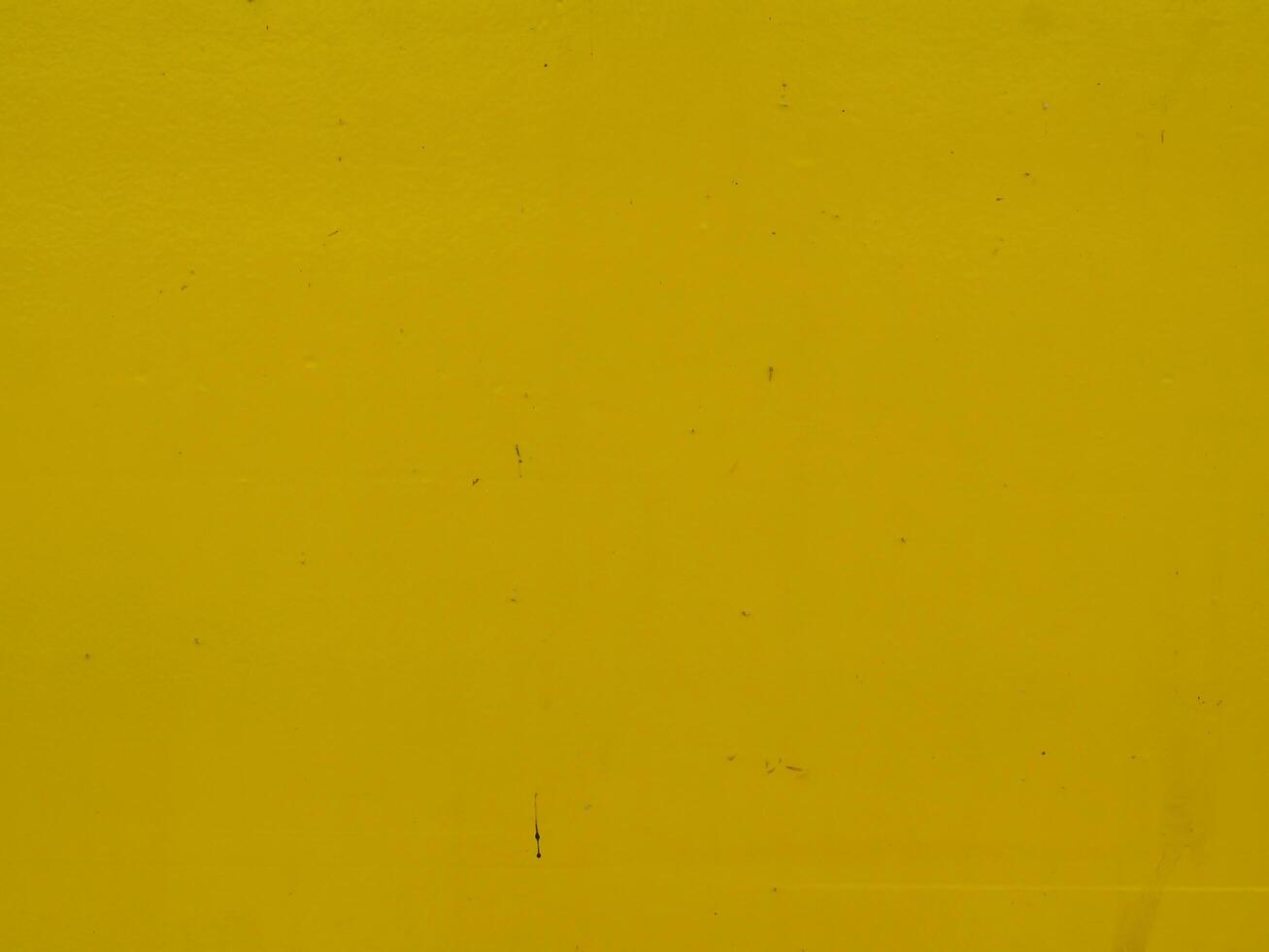 Yellow painted steel texture for a close-up background of a building or construction. photo