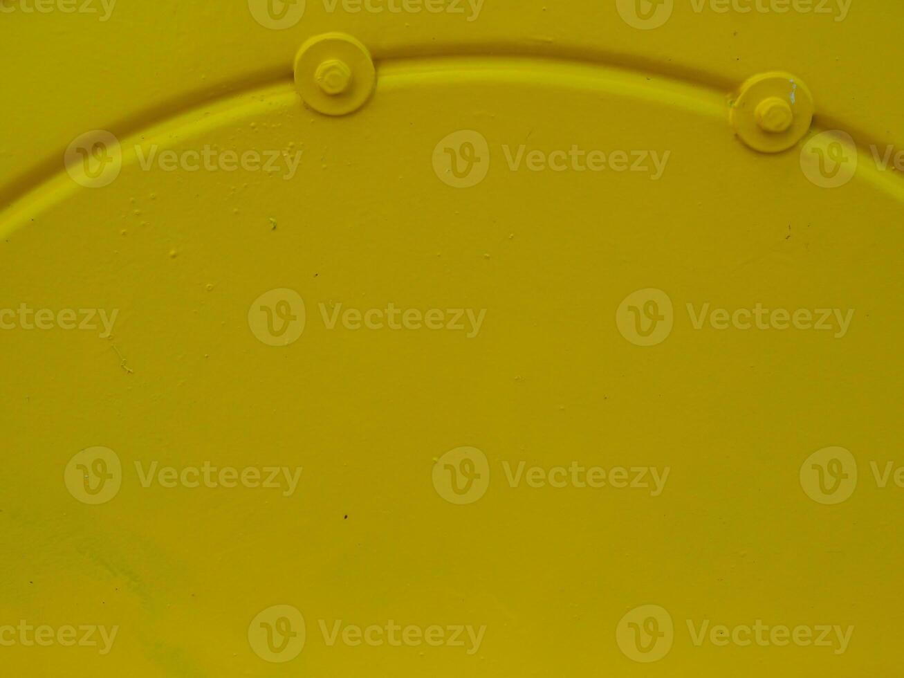 Yellow painted steel texture for a close-up background of a building or construction. photo