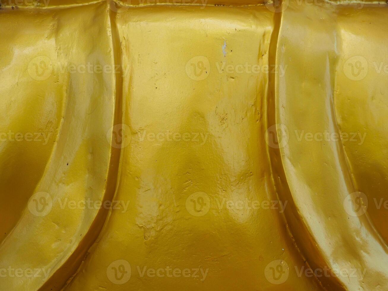 Golden texture at Buddhist temple, close-up for abstract background. photo