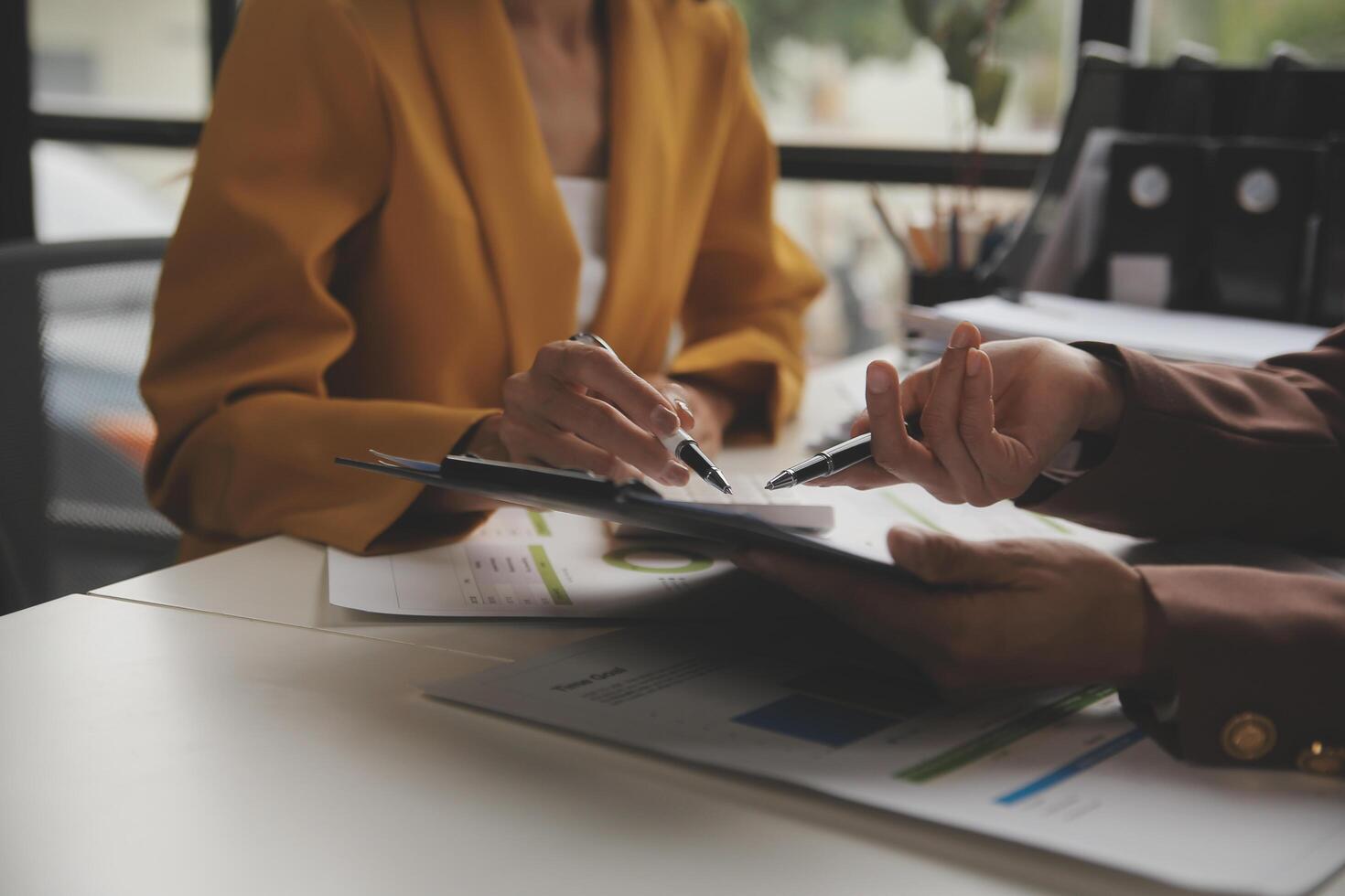 Team of business people working together in the meeting room office, teamwork background charts and graphs banner, double exposure successful teamwork,business planning concept. photo