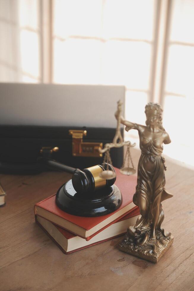 Lawyer, legal advisor, businessman brainstorming information on agreement details Business contracts in legal processing books for accuracy in contract documents. joint financial investment. photo