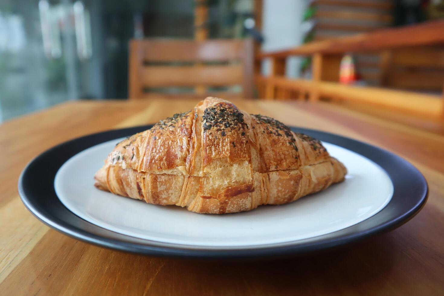Croisants with various kinds of toppings are often found on cafe or coffee shop menus photo