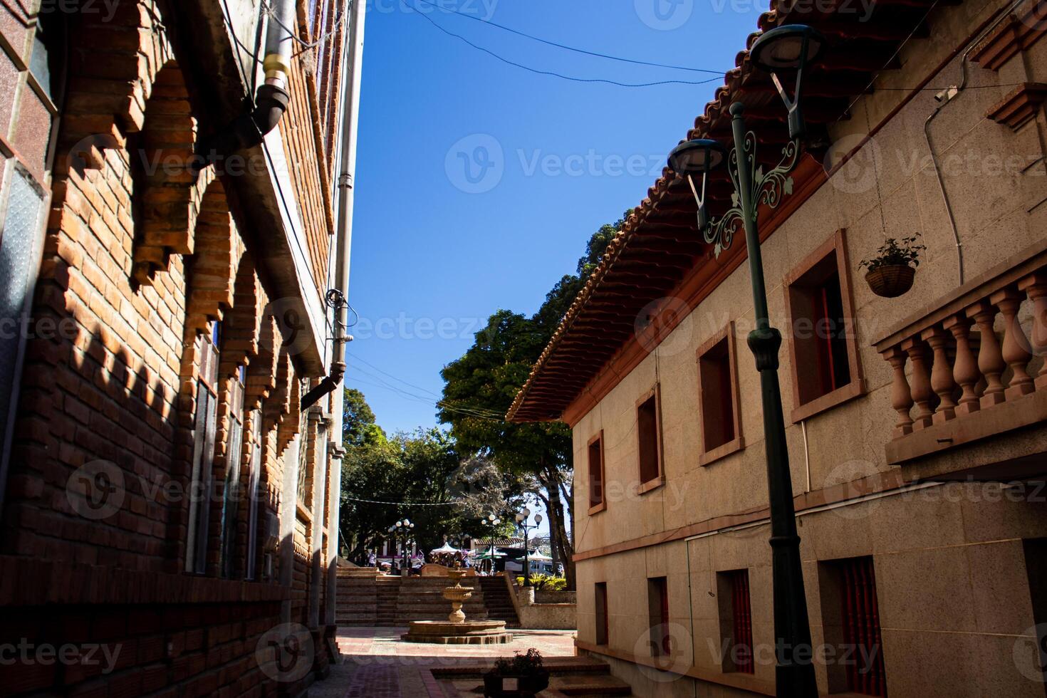 Beautiful alley next to the Cathedral Our Lady of Las Mercedes at the Holy Mother Laura Montoya natal town of Jerico in the department of Antioquia. photo