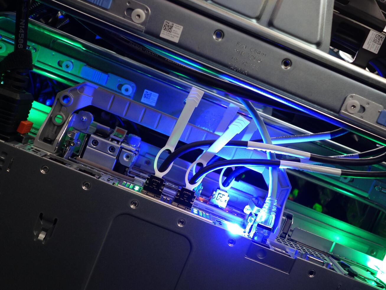 network cables connected to switch - closeup of data center hardware technology photo