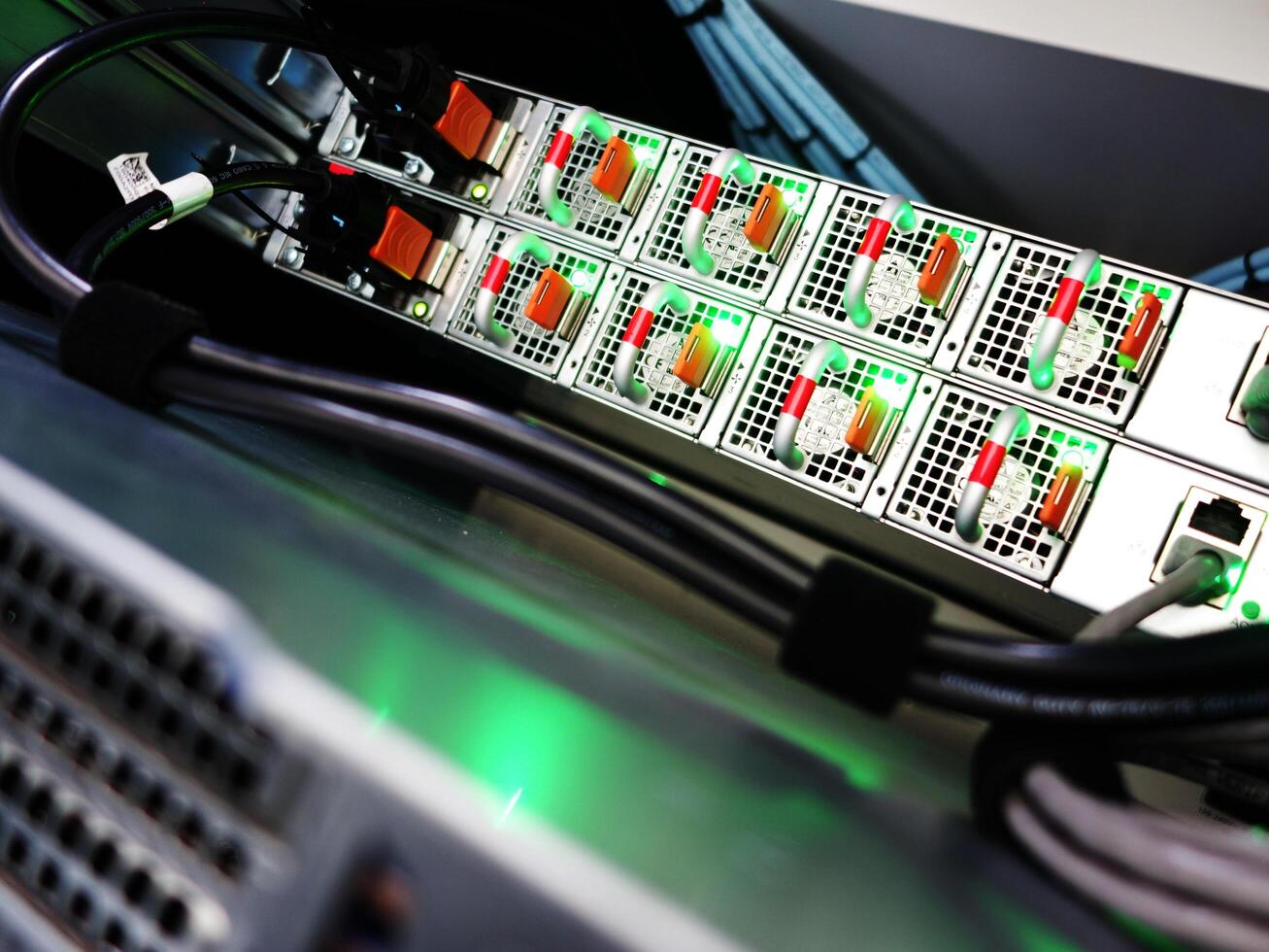 network cables connected to switch - closeup of data center hardware technology photo
