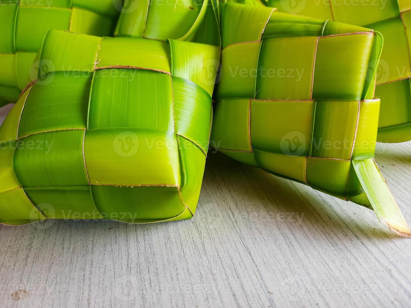 Close up of ketupat. Woven from green coconut fronds, a traditional Indonesian food photo