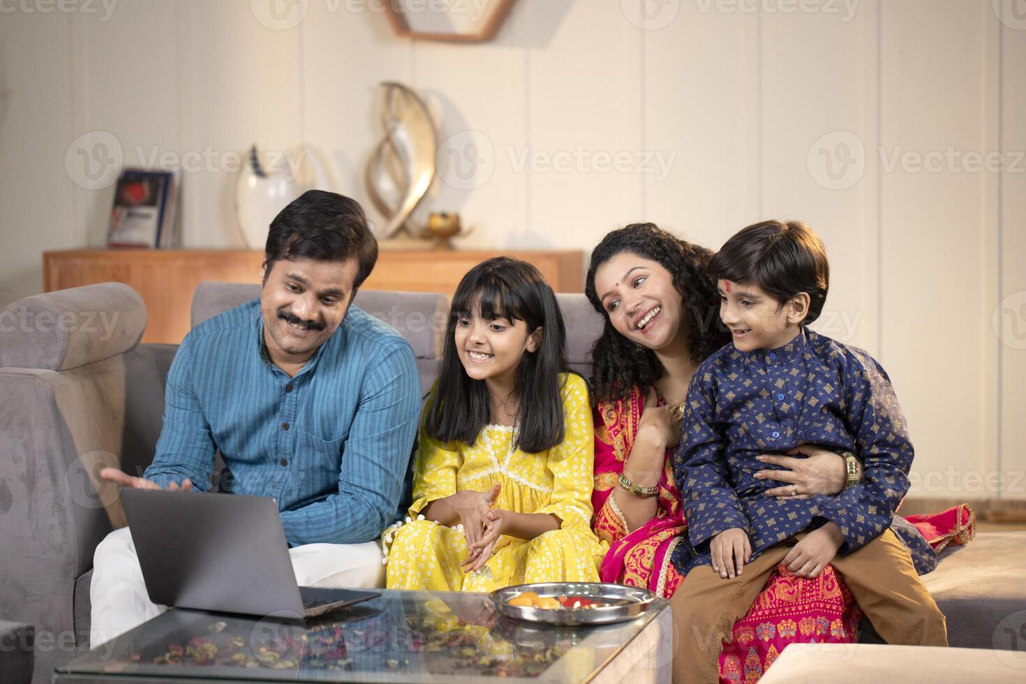 Peaceful Family Talking On Call On Laptop photo