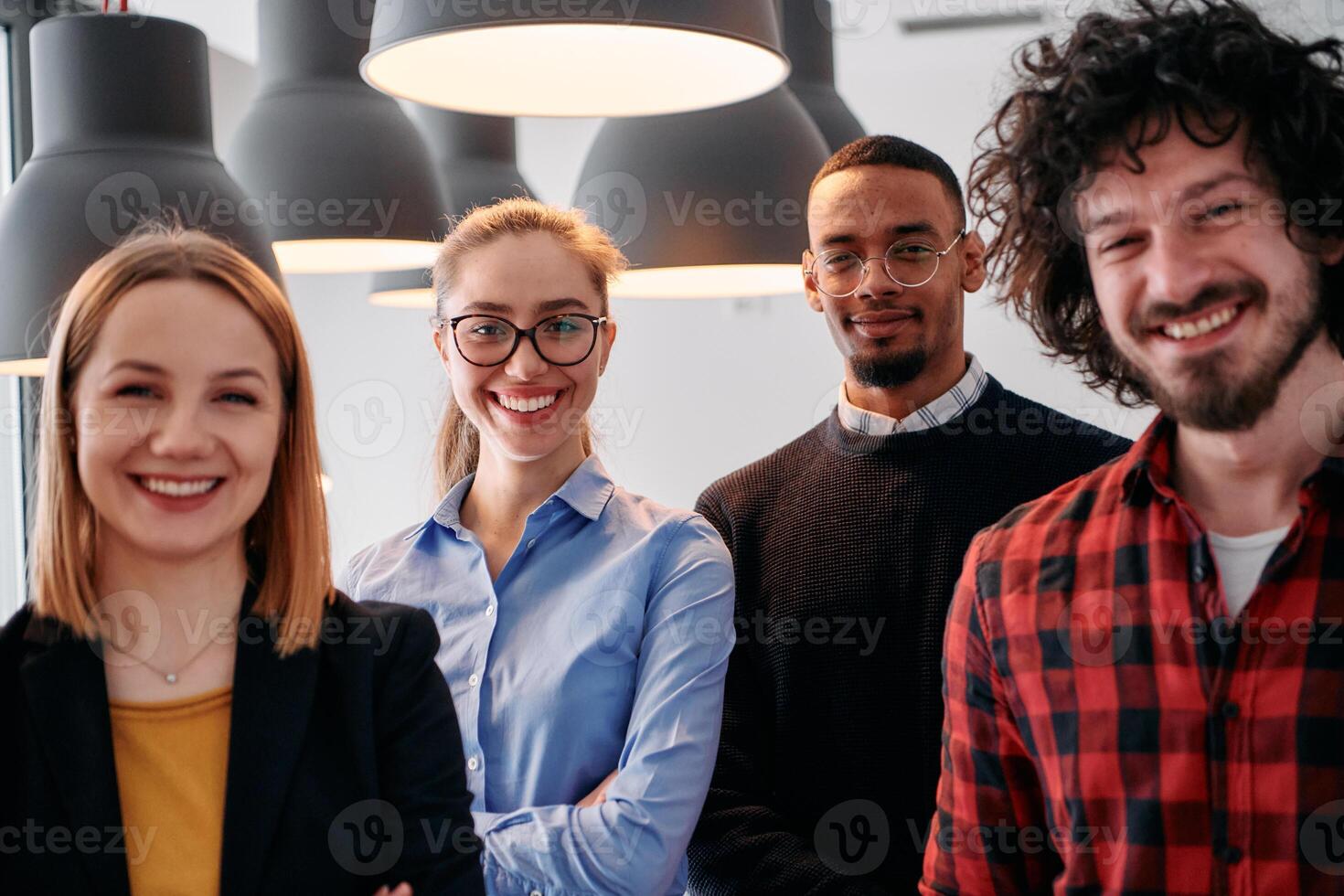 Diverse Business Team Standing United in Modern Office Ready for New Challenges. photo