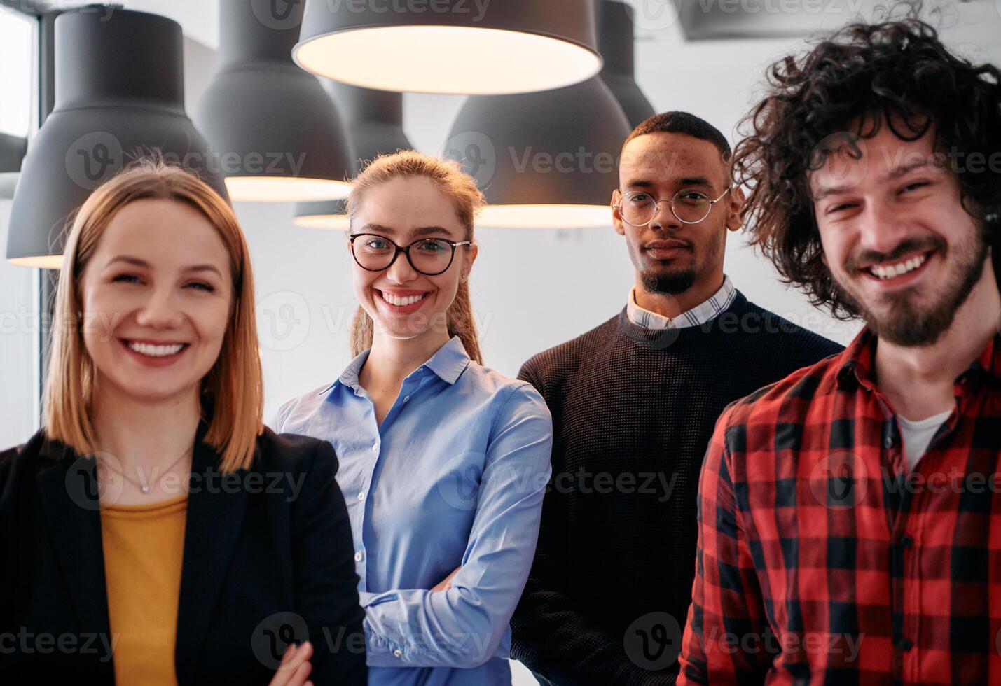 Diverse Business Team Standing United in Modern Office Ready for New Challenges. photo