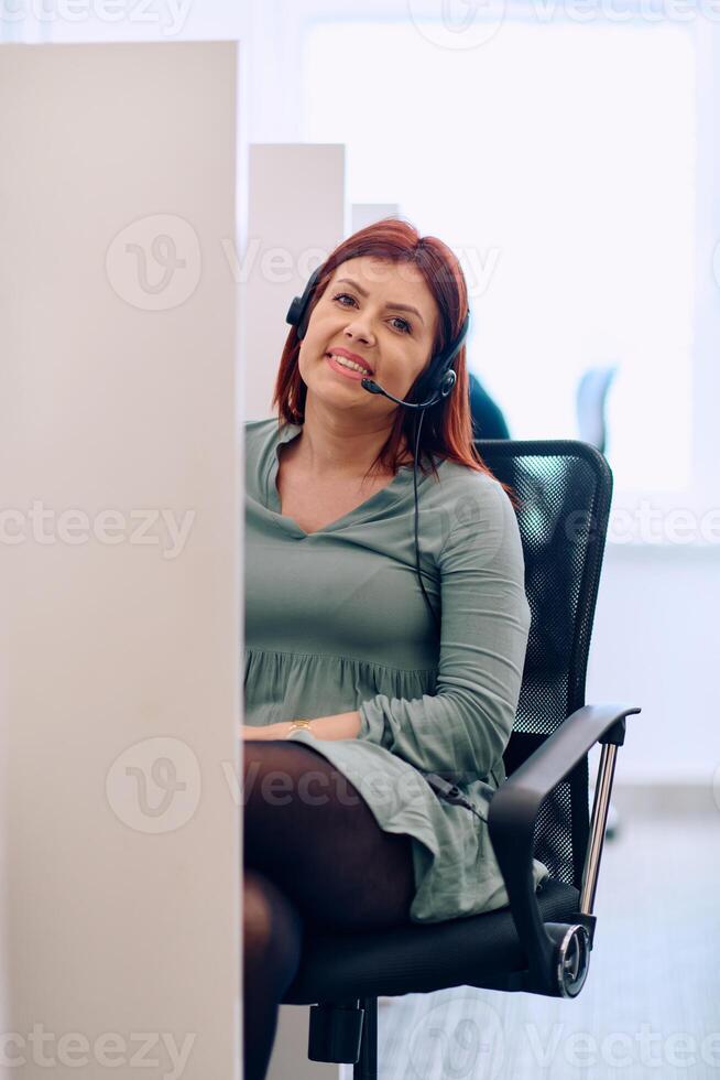 Female Call Center Agent Providing Customer Support and Assistance. photo